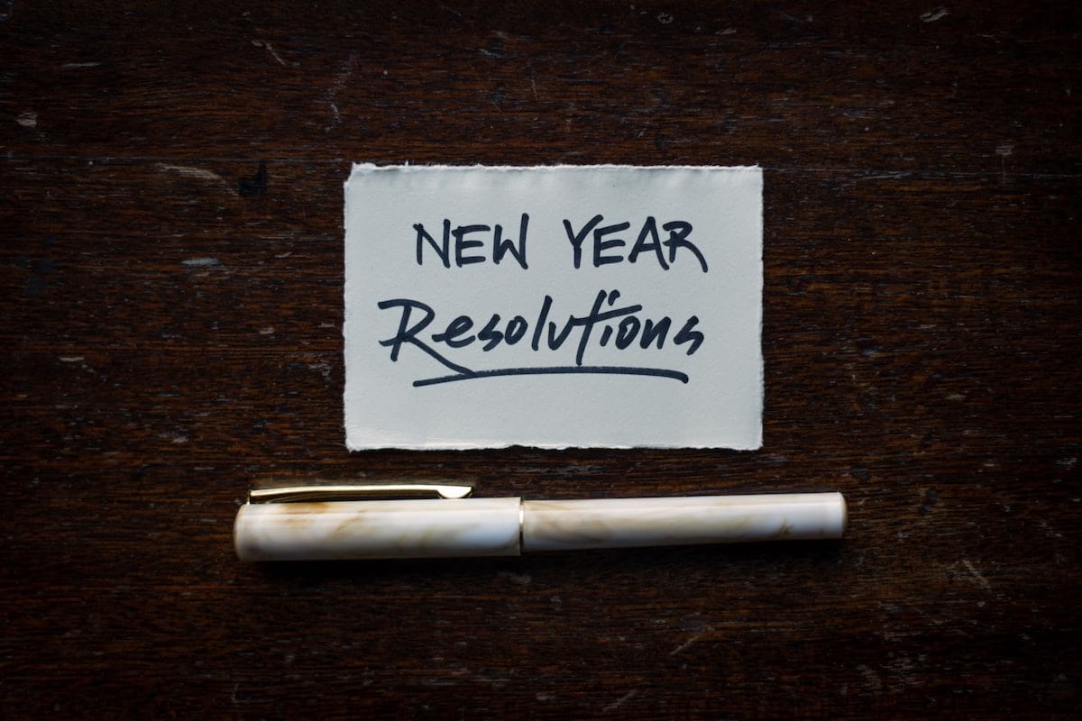new years resolutions written with ink in a piece of paper